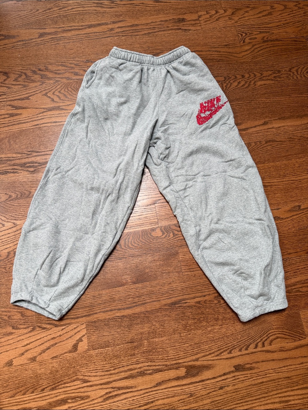 Nike Men's Stranger Things Gray Sweatpants with Red Swoosh Accent Small
